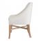 White upholstered wood frame dining chair with cerused oak legs side view
